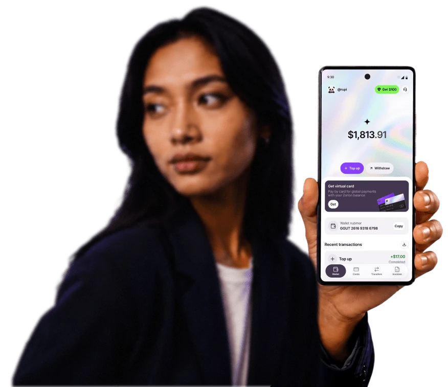 A Zorion customer holding a phone with the app open